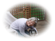 A dog and a women